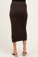 woman wearing a brown ribbed maternity midi skirt, shown from the back