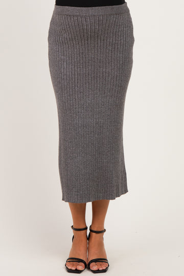 maternity ribbed grey midi skirt with a fitted waist and hem detail, styled with strappy black heels