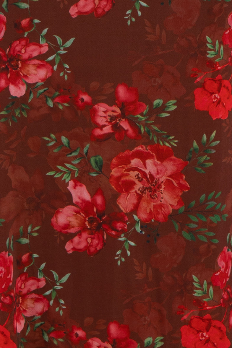 maternity wear featuring a dark brown background with red floral print throughout