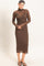 woman wearing a brown sheer long sleeve midi dress with a turtleneck and textured design