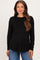 woman wearing a black long sleeve maternity top with a layered design and a visible baby bump