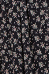 maternity wear in navy blue with a floral print pattern and pleated design