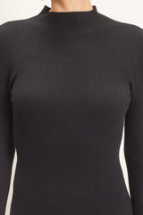 black ribbed long sleeve top with a mock neck design