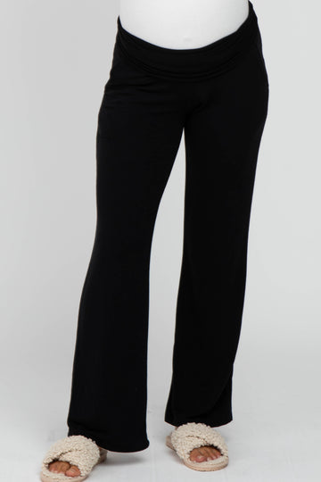 maternity wear black flared pants with a foldover waistband, model not visible
