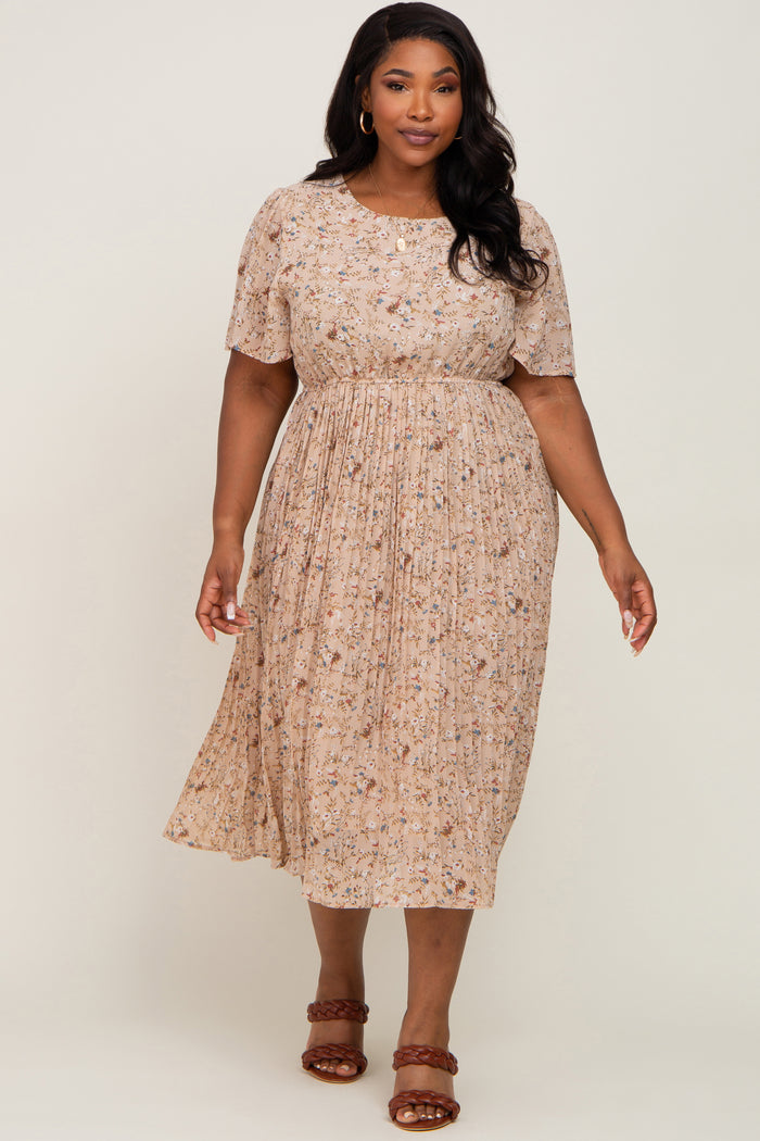 Plus size woman wearing a beige floral midi dress with flutter sleeves and a pleated skirt