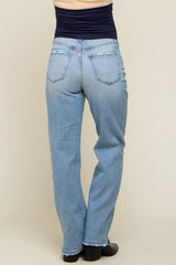 woman wearing light blue maternity jeans, shown from the back