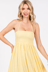 Yellow Smocked Halter Cutout Maxi Dress