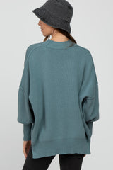 Light Teal Mock Neck Exposed Seam Sweater