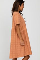 Peach Textured Babydoll Dress