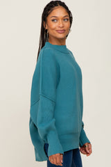 Teal Blue Mock Neck Exposed Seam Sweater